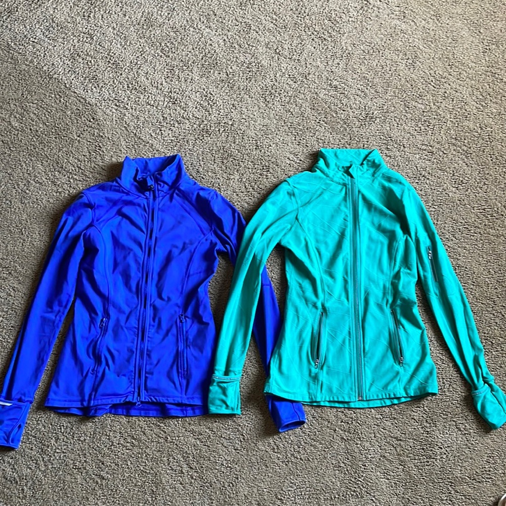 Athletic zip ups. Sold together size small.